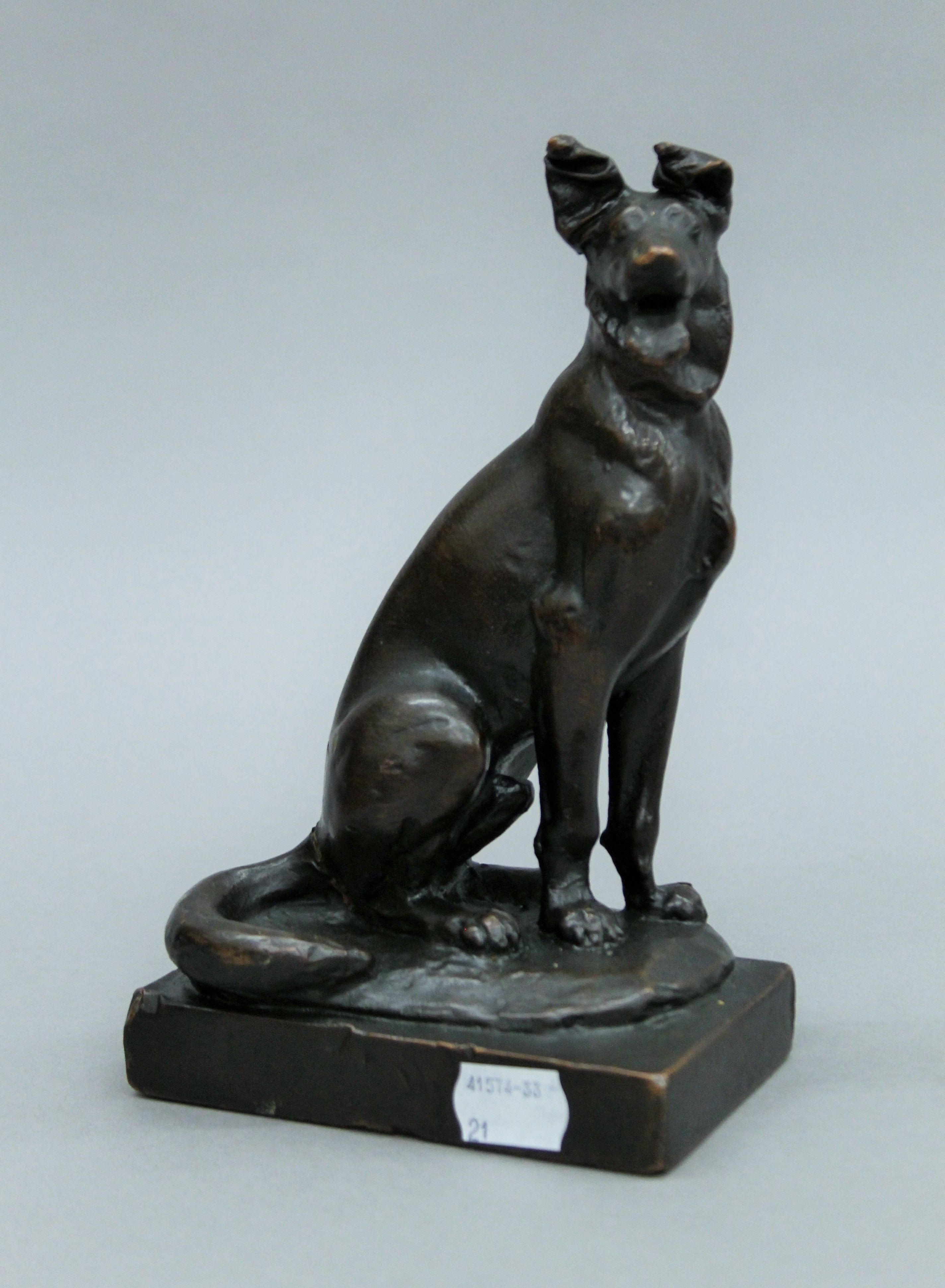 A bronzed figure of a German shepherd, signed Paul Herzel (1876-1956) and two bronze models of dogs. - Image 4 of 5