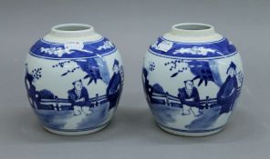 A pair of Chinese blue and white porcelain ginger jars. 14.5 cm high.