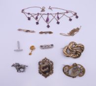 A quantity of gold and silver jewellery, etc., including Victorian mourning brooches.