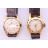 A Tissot 18 ct gold cased lady's wristwatch and another Tissot lady's wristwatch.