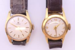 A Tissot 18 ct gold cased lady's wristwatch and another Tissot lady's wristwatch.