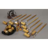 An antique box croquet table set for eight players.