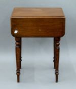 A mahogany Pembroke work table. 40.5 cm wide flaps down.