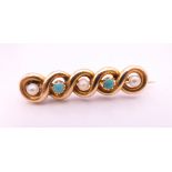 An unmarked gold bar brooch decorated with turquoise and seed pearls. 3.5 cm long. 3.