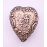 A silver heart shaped trinket box. 5.5 cm high. 34.6 grammes.