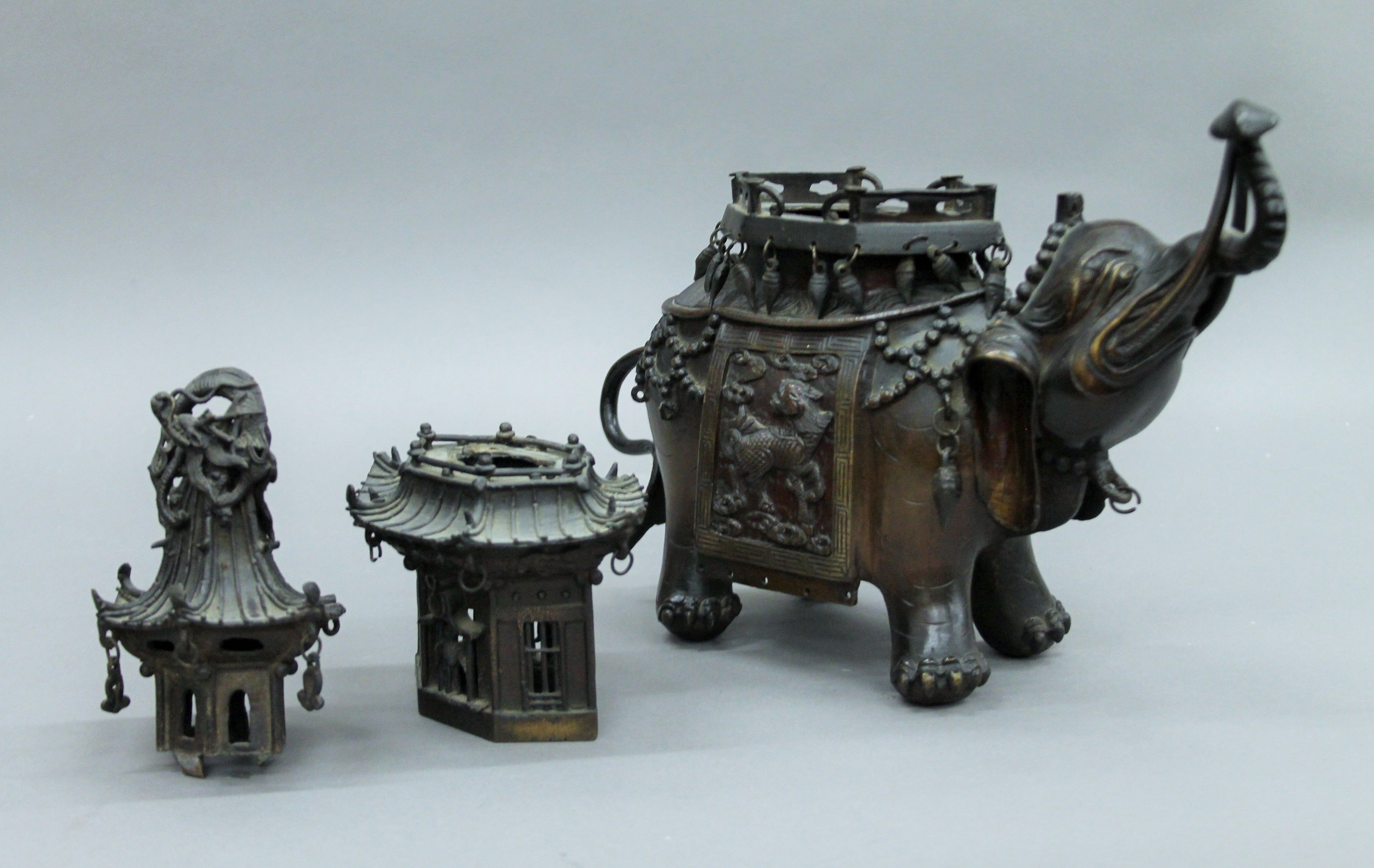 A Chinese bronze censer formed as an elephant with a pagoda on its back. 38 cm high. - Image 6 of 7