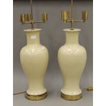 A pair of Chinese porcelain vases, fitted as lamps. Each 90 cm high overall.