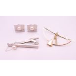 A pair of silver cufflinks and matching tie pin with cultured pearl and another item.