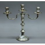 A silver candelabra. 30 cm high. 807.5 grammes loaded.