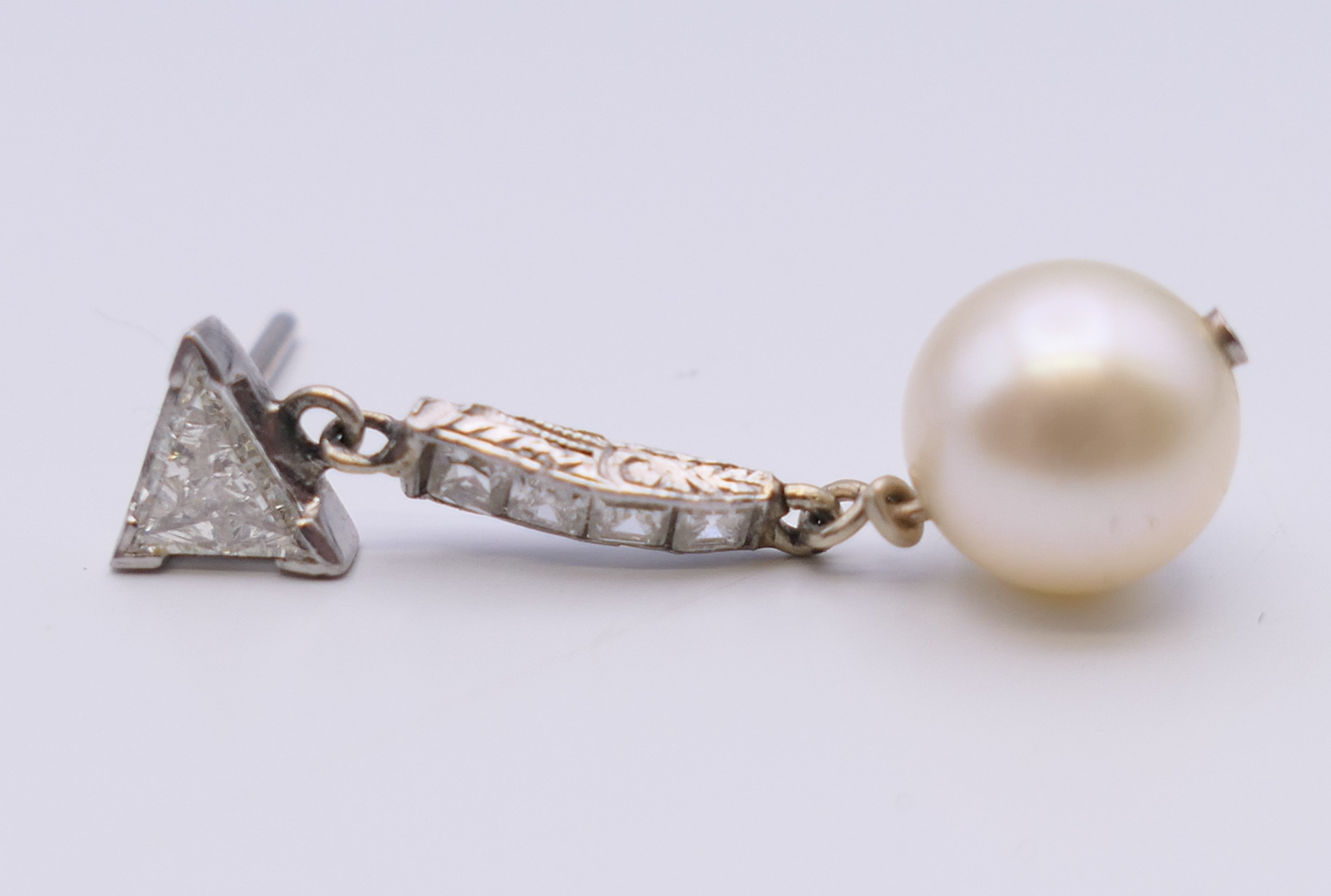 A pair of Art Deco diamond and pearl earrings. 3 cm high. - Image 3 of 7
