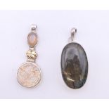 Two silver stone set pendants. Largest 5 cm high.