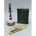 A mahogany table lamp, a key cupboard and a vintage skipping rope. The former 36.5 cms high.