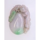 A two tone jade pendant. 7 x 5 cm.