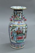 A 19th century Canton porcelain vase. 21.5 cm high.