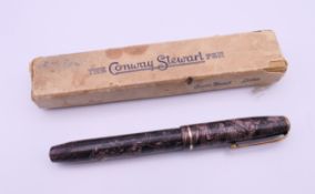 A Conway Stewart fountain pen with a 14 ct gold nib, in original box.