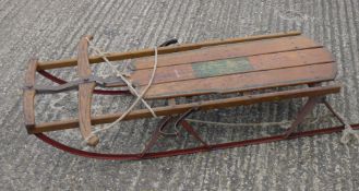 A vintage sledge. 128 cm long.
