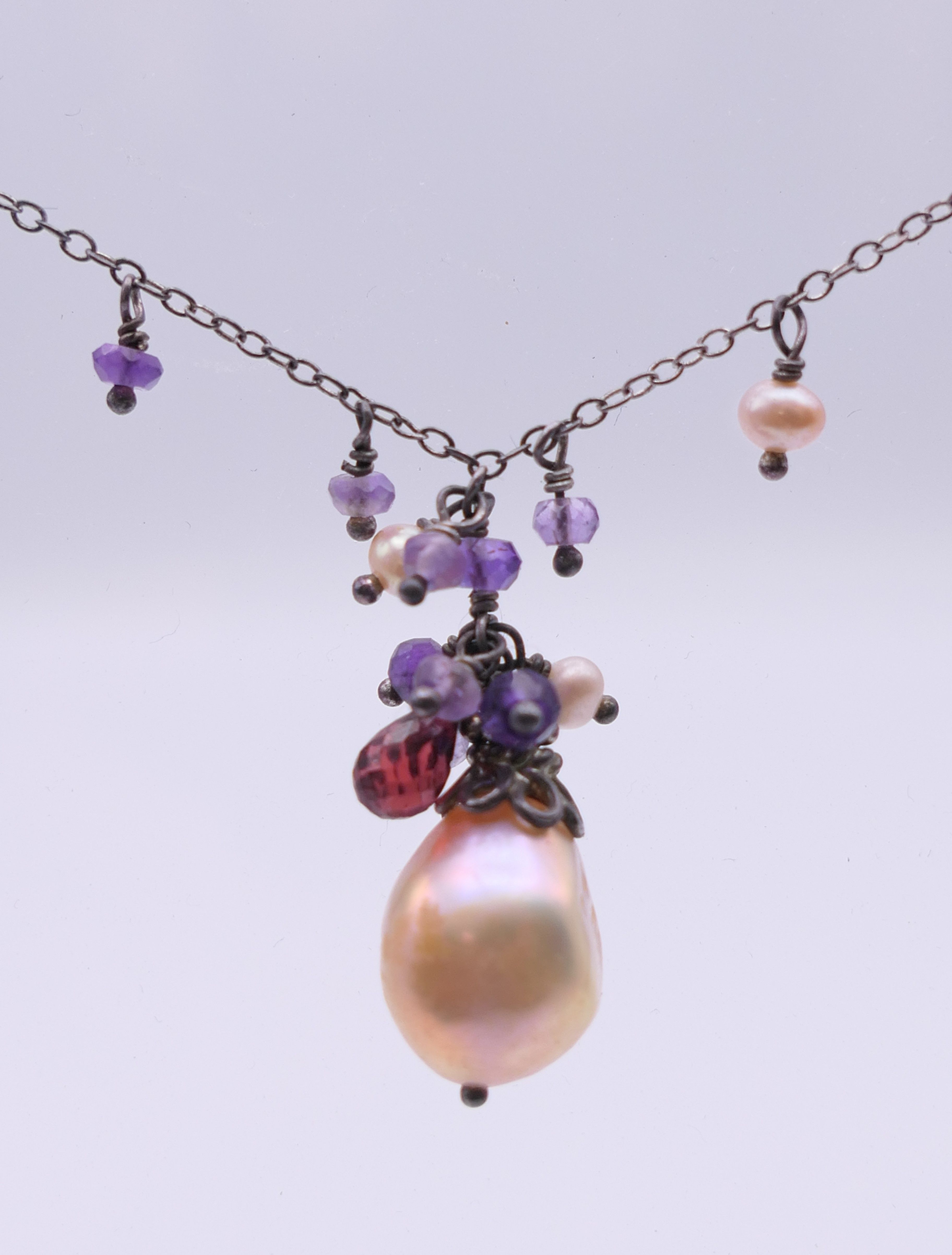 A pearl set necklace on a silver chain and a pair of matching earrings. - Image 2 of 5