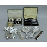 A cased silver dressing table set and a quantity of silver plate.