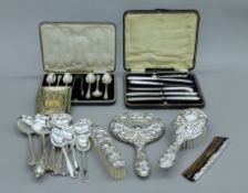 A cased silver dressing table set and a quantity of silver plate.