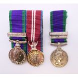 Three miniature medals with bars, two Northern Ireland and a South Arabia. 5.