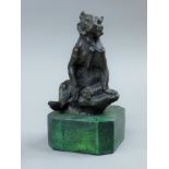 A bronze model of a bear on a plinth base. 16.5 cm high.