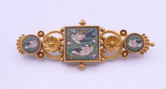 A Victorian unmarked gold pietra dura brooch, boxed. 6 cm long. 10.7 grammes total weight.