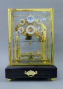 A rolling ball Congreave clock. 43 cm high.