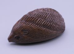 A netsuke formed as a hedgehog. 5 cm long.