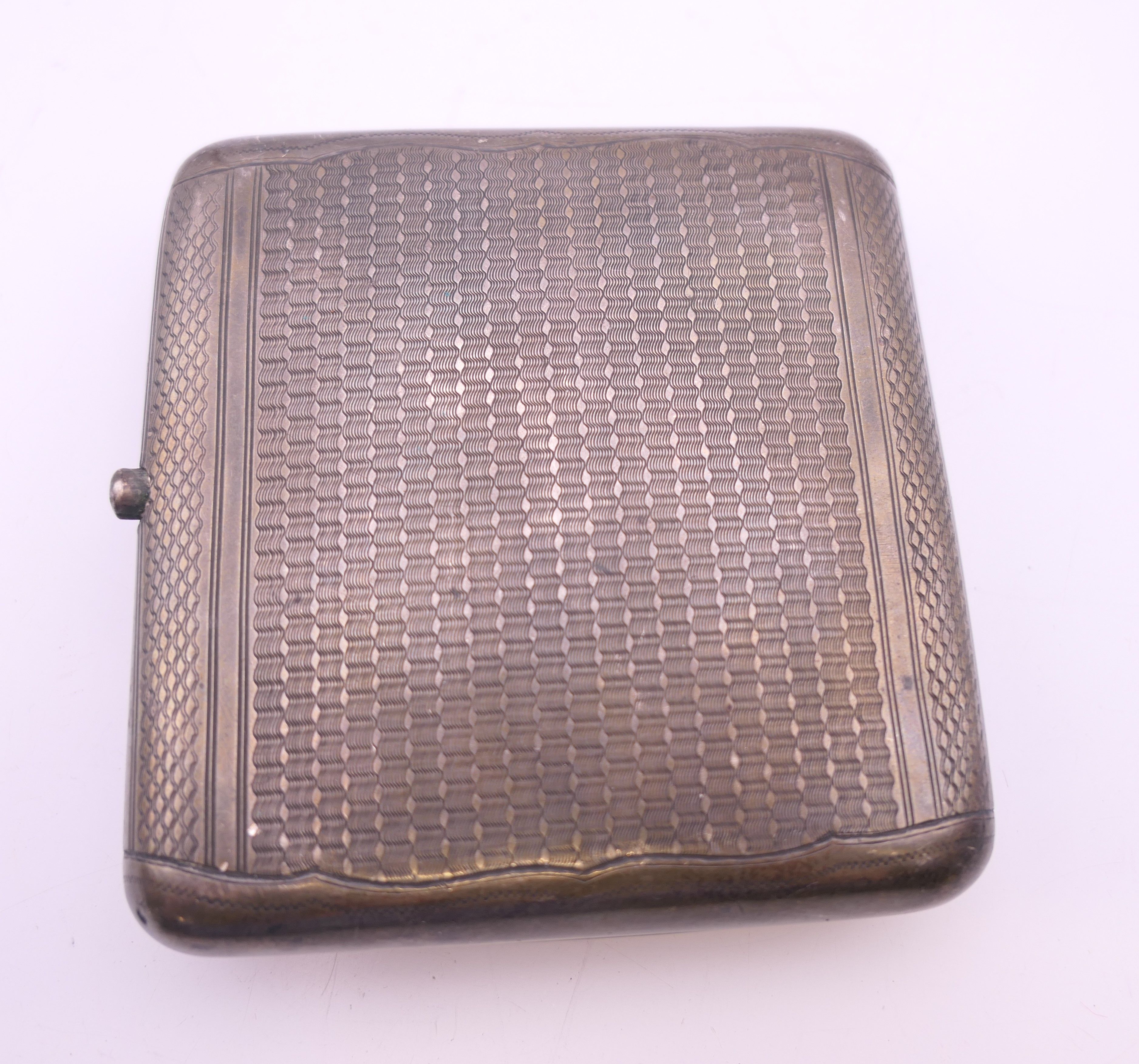 A Russian silver cigarette case. 8.25 x 8.5 cm. 120.5 grammes total weight. - Image 2 of 6