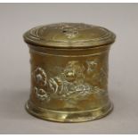 A brass Art Nouveau tobacco pot. 10 cm high.