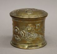 A brass Art Nouveau tobacco pot. 10 cm high.