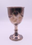 A silver trophy cup. 11 cm high. 74.3 grammes.