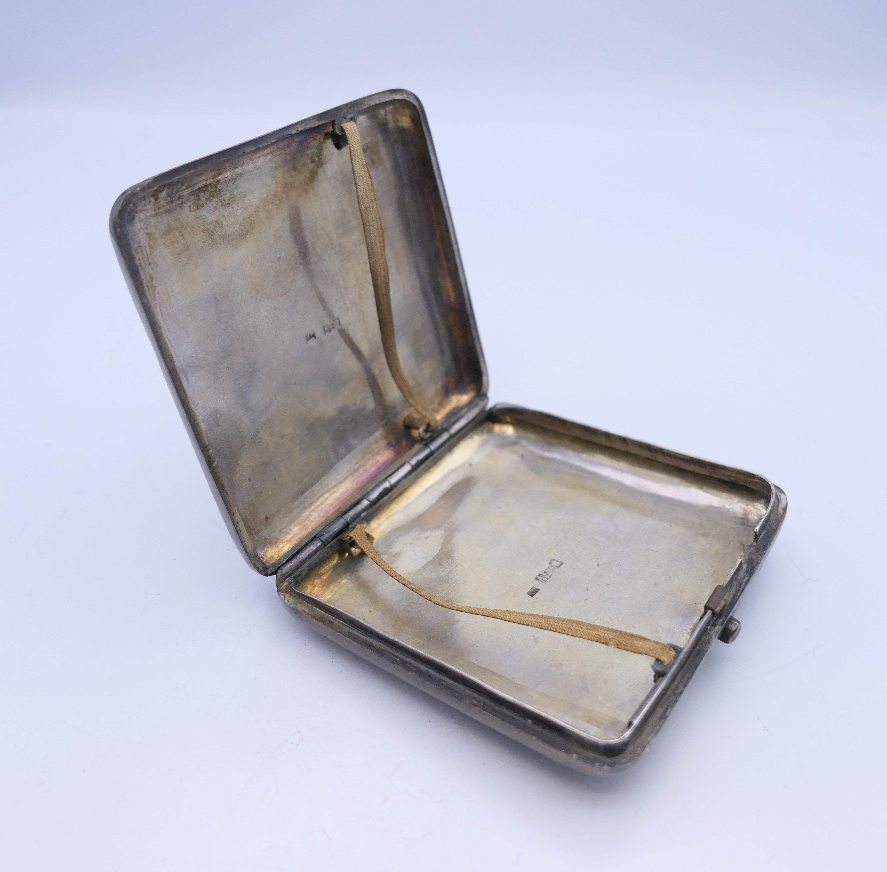 A Russian silver cigarette case. 8.25 x 8.5 cm. 120.5 grammes total weight. - Image 3 of 6