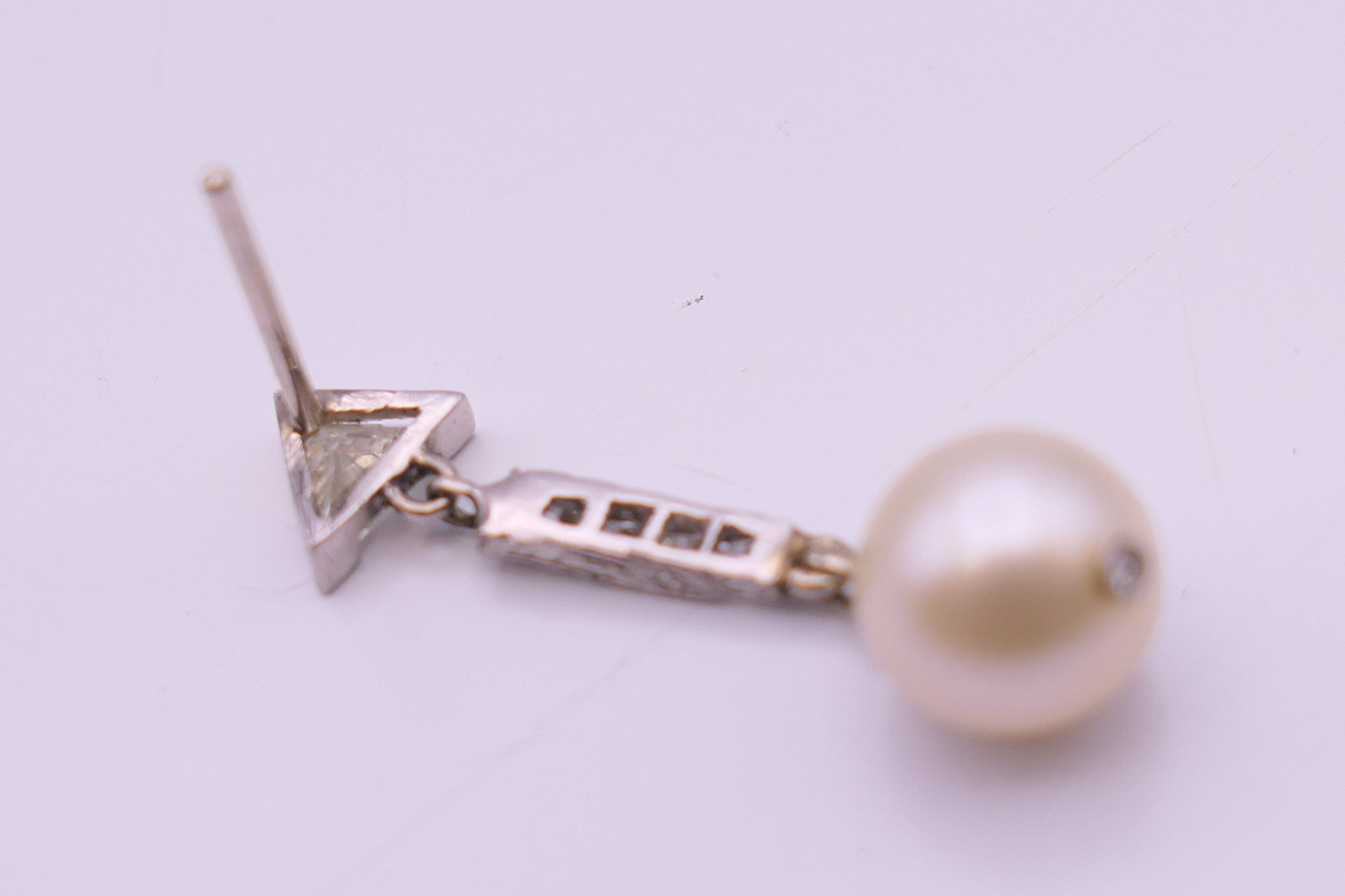 A pair of Art Deco diamond and pearl earrings. 3 cm high. - Image 4 of 7