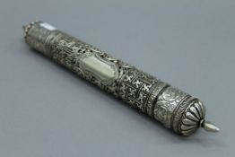 A Tibetan 800 silver prayer scroll holder. 30 cm long.