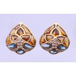 A pair of 18 ct gold heart shaped earrings set with topaz, citrine and diamond. 3 x 2.75 cm. 28.