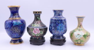 A collection of four Chinese cloisonne items. Dark blue vase 11 cm high.