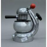 An Atomic coffee maker by A & M G Sassoon. 24 cm high.