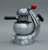 An Atomic coffee maker by A & M G Sassoon. 24 cm high.