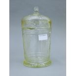 A lidded glass pot commemorating the 25th Jubilee of George V and Queen Mary. 26 cm high.