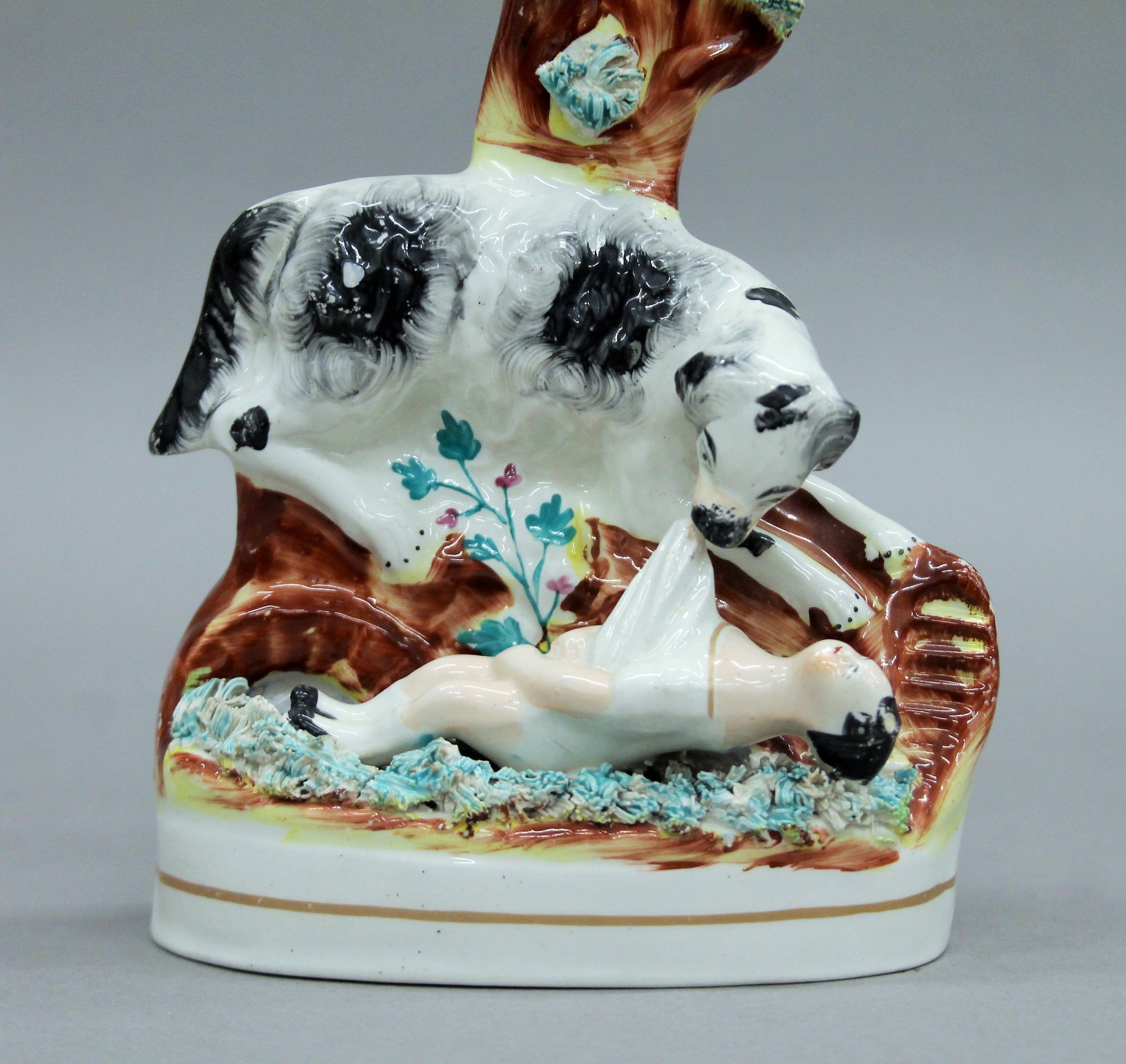 Two 19th century Staffordshire pottery spill vases formed as The Dog that Saved the Downing Girl. - Image 3 of 5