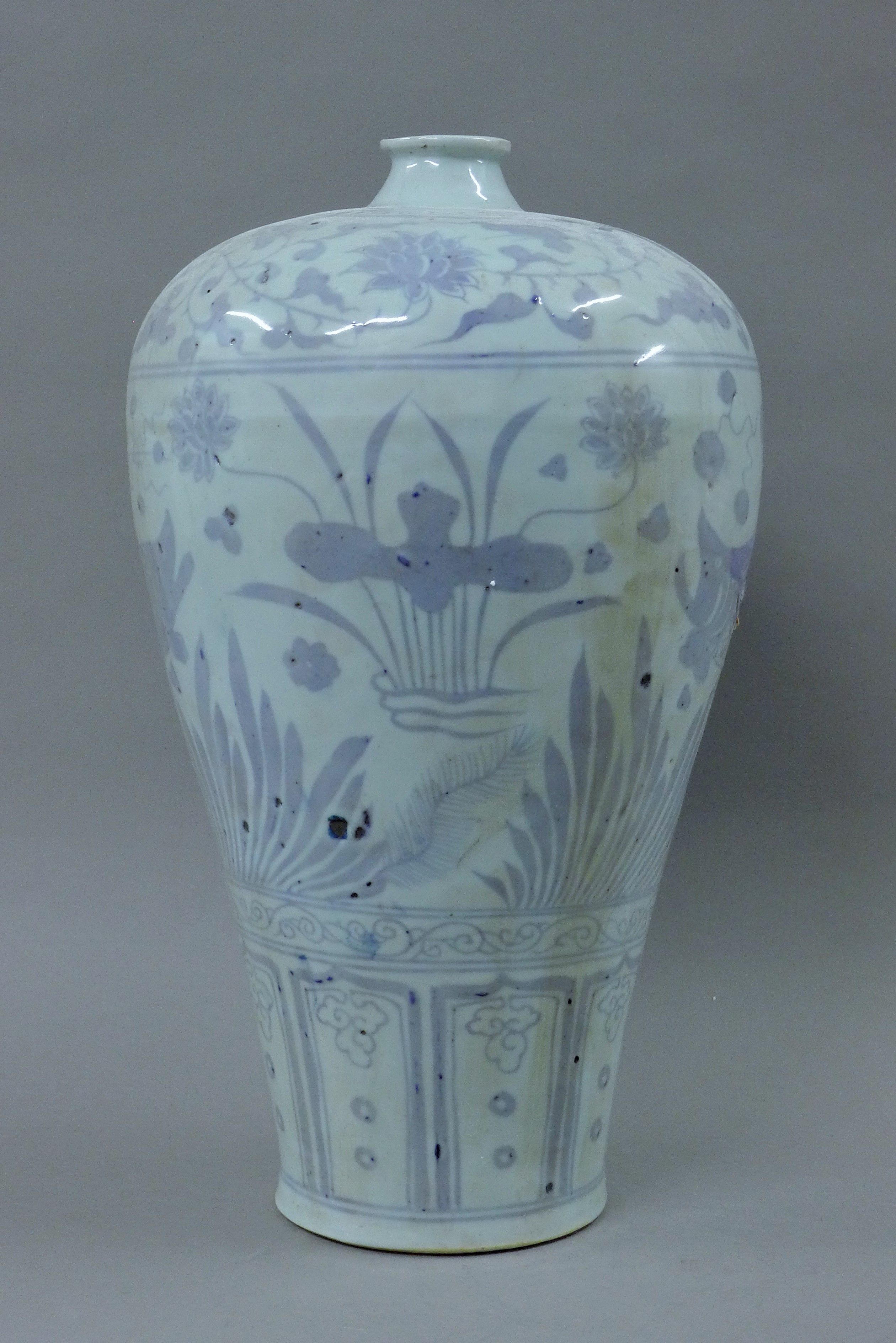A Chinese blue and white porcelain vase. 45 cm high.