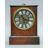 A Victorian mahogany mantle clock. 28 cm high.