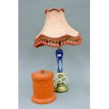 A Victorian terracotta lidded pot and a table lamp. The former 16.5 cm high.