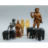 A box of various model figures, elephants, etc.