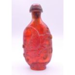 A Chinese snuff bottle and stopper. 8 cm high.