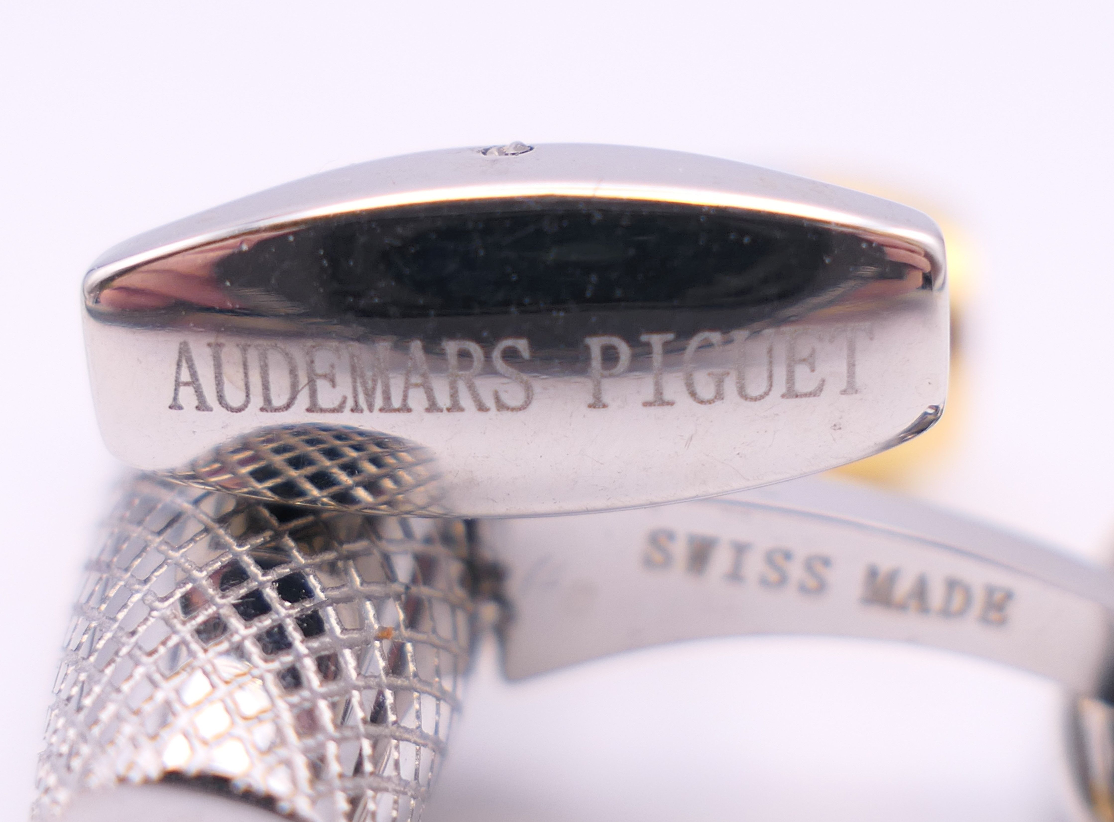 A pair of cufflinks stamped AP and Audemars Piguet. 2.25 cm long. - Image 2 of 2