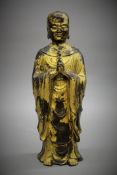 A gilt bronze Oriental model of Buddha. 30 cm high.