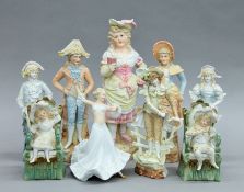 A quantity of Continental porcelain figures. The largest 32 cm high.