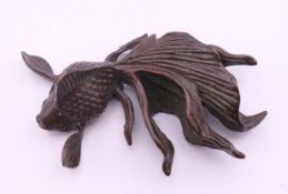 A bronze model of a fish. 8.5 cm long.